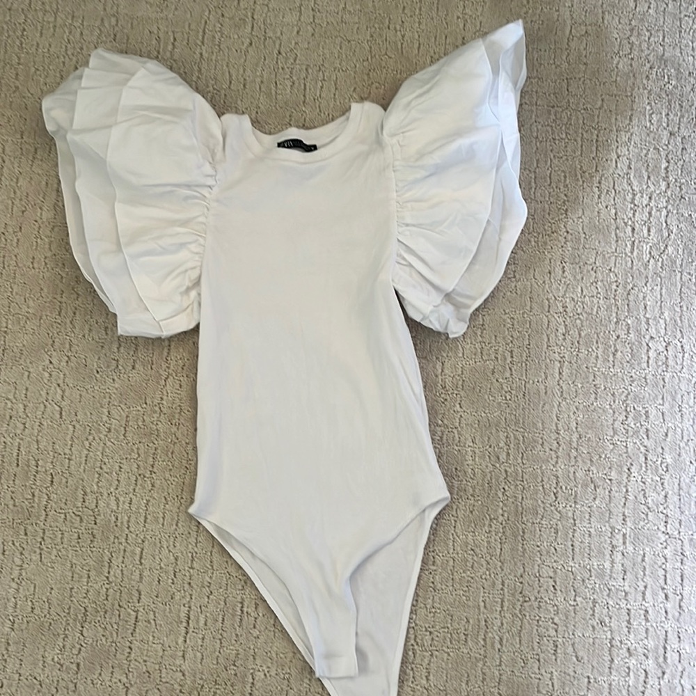 white ruffled zara bodysuit